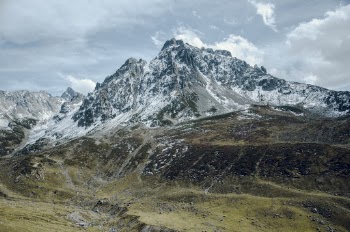 White and Black Mountains Under White Sky