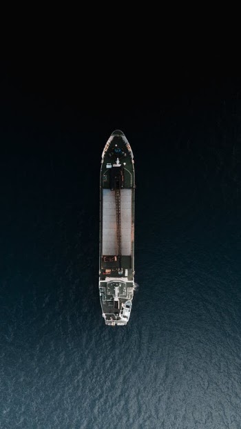 White and Black Space Ship on Sea during Nighttime · Free Stock Photo