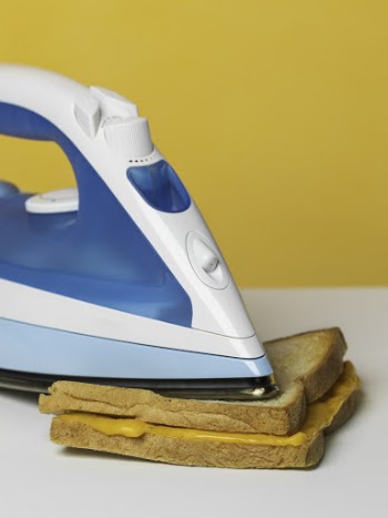 White And Blue Steam Iron