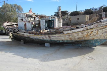 White and Blue Wooden Boat