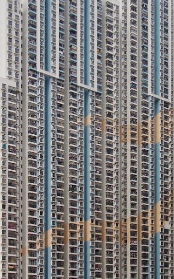 white and brown concrete apartment building