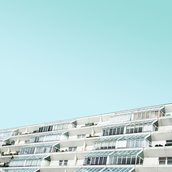 white and brown concrete building at daytime