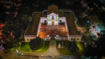 White and Brown Concrete Building in Aerial Photography at Night