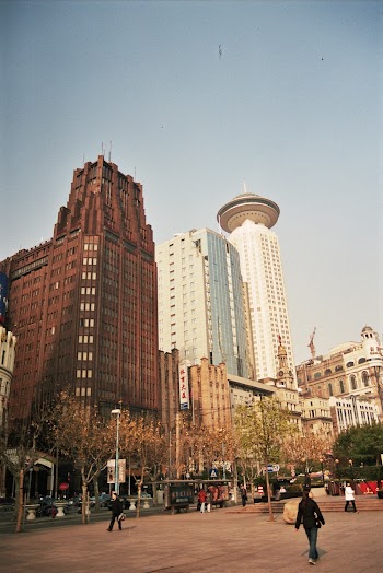 White and Brown Concrete High-rise Building