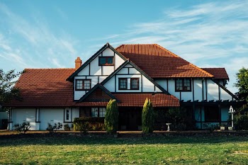 white and brown house during daytime