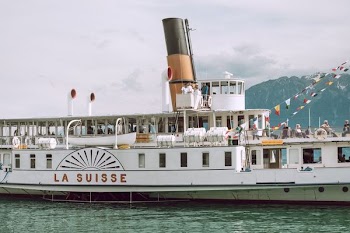 white and brown La Suisse ship