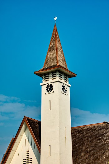 White and Brown Tower Under Blue Sky