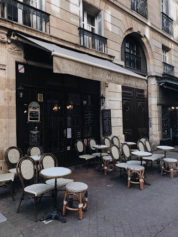 White and Brown Wooden Dining Sets in Cafe Front