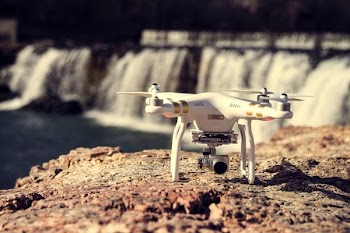 white and gold DJI Phantom Professional quadcopter