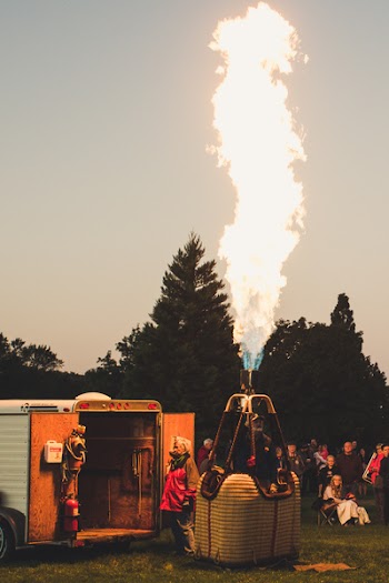 White and Gray Trailer Near Hot Air Balloon