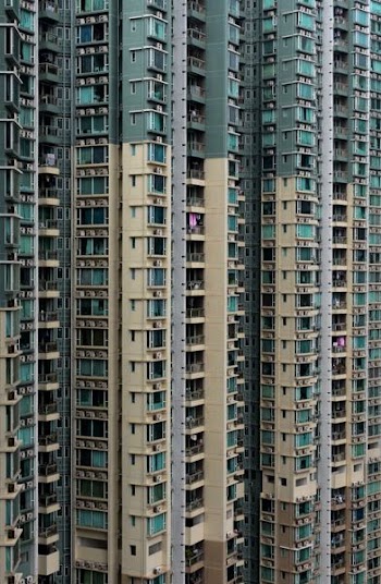 white and gray wall paint high-rise building during daytime