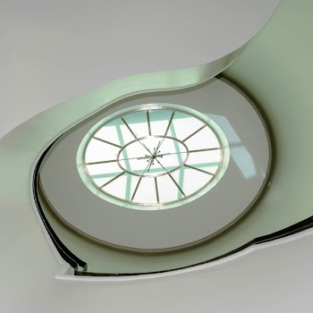 white and green spiral staircase building