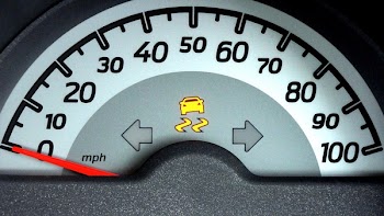 White and Grey Car Speedometer Gauge on 0 Miles Per Hour