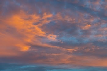 White and Orange Clouds