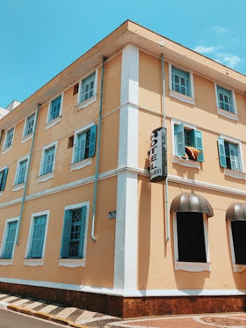 White and Peach Concrete Building