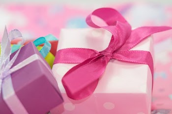White and Purple Gift Box With Pink and White Ribbon