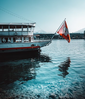 White and Red Flag on Boat