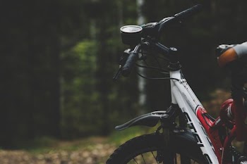 white and red full-suspension bicycle