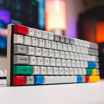 white and red keyboard on white surface