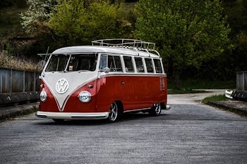 white and red Volkswagen van on road