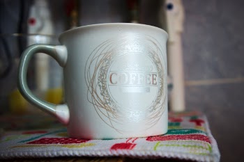 White and Silver Ceramic Mug