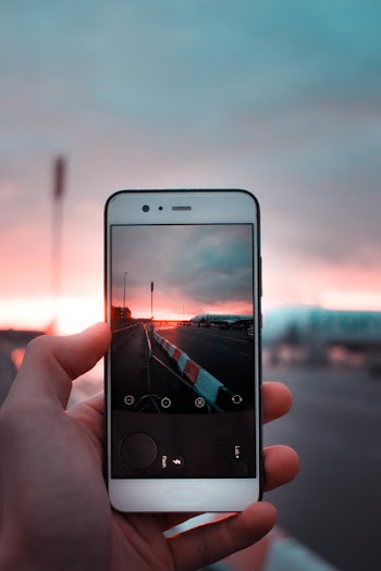 White Android Smartphone Capturing Road