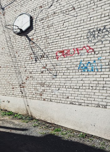 White Basketball Hoop Hanging on Wall
