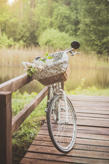 White Bicycle Near Fence