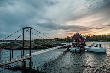 white boat near red and gray structure