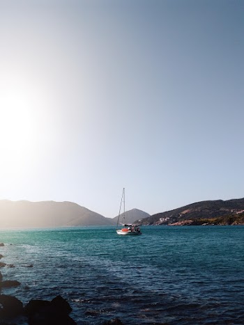 White Boat on Body of Water