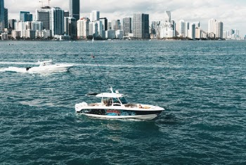 White Boat On Body Of Water