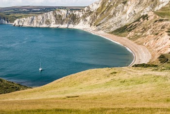 White Boat on Body of Water