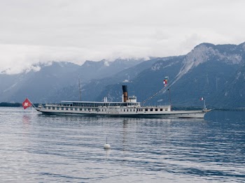 White Boat on Body of Water