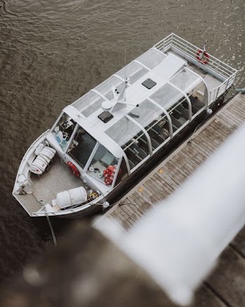 white boat on dock during daytime