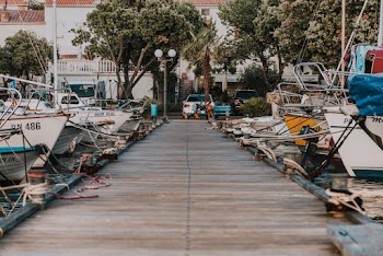 White Boats Near Brown Sea Dock
