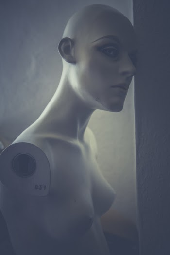 White Body Form in White Concrete Wall