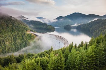white bridge between mountains