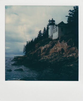 White Building Near Body of Water