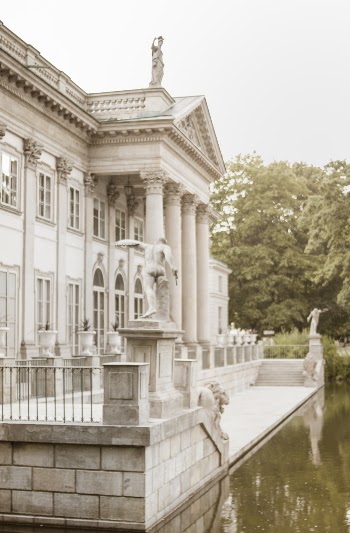 White Building Near Body of Water