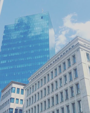 White Building Near Curtain Building