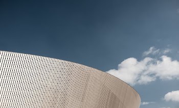 white building under blu sky