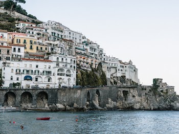 White Buildings Near Body of Water