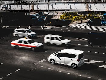 white cars on black road