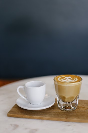 White Ceramic Cup And Cappuccino
