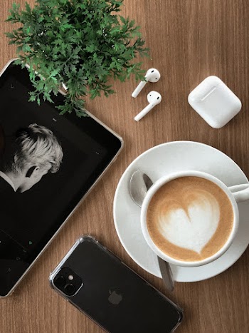 White Ceramic Cup and Iphone