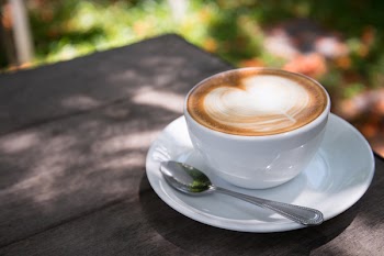 White Ceramic Cup Filled With Latte