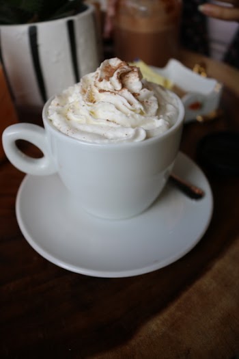 White Ceramic Cup With White Cream
