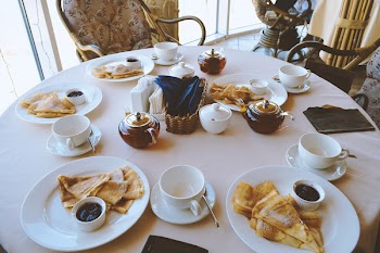 White Ceramic Dinnerware on Table