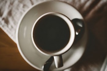 white ceramic mug in flat lay photography
