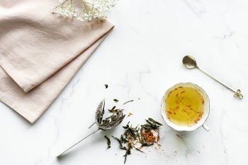 White Ceramic Teacup on White Surface